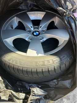BMW stock rims with tires band new
