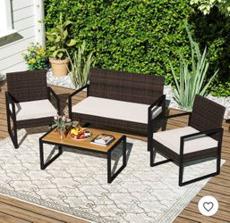 Shop all Costway Costway 4 Piece Patio Furniture Set with Cushioned Chairs & Wood Plastic Coffee Table