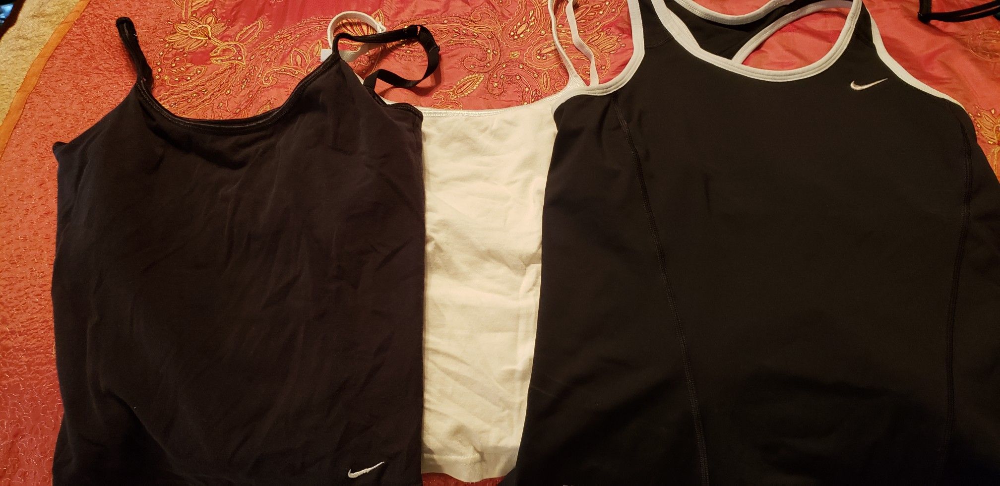 3 Nike size small work out shirts