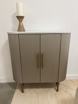 Fluted marble top cabinet table