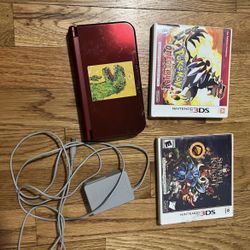 Nintendo 3DS XL with wall charger, Pokémon Omega Ruby and Shovel Knight 