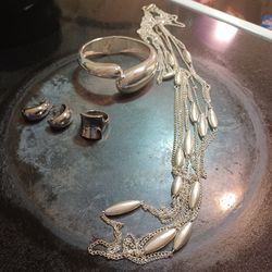 Beautiful bracelet, earrings, necklace and ring.