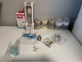 New baby bottles & pacifiers