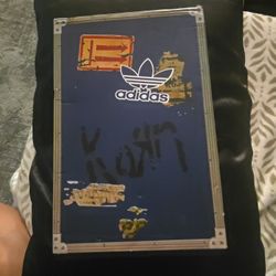 Korn Adidas shoes, no shoestrings.