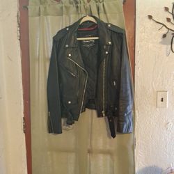A woman's motorcycle jacket size extra large. Oh, my gosh, you're still you've real leather woman's extra large