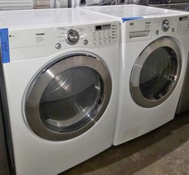 LG front loading washer & gas dryer set working perfecty with 4 months warranty