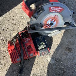 Milwaukee Saw + Battery + Charger 