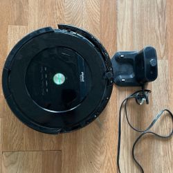 Roomba Vacuum & Charger (both work good)