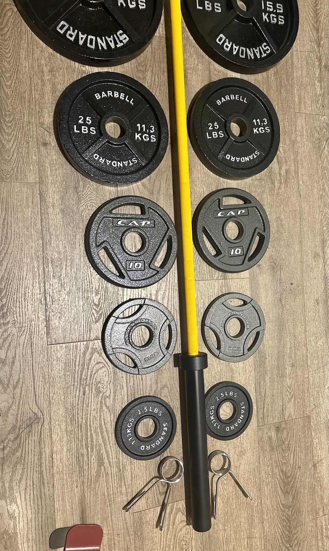 Beautiful BRAND NEW Olympic Equipment: Bar And Full Set Of Weight Plates. Total Of 290 lbs