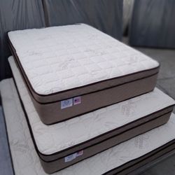 Queen Size Pillow Top Mattress 12"     New Mattress in a plastic sealed