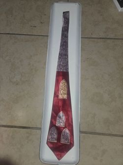 vintage Bullock's Los Angeles Crestline tie features a deep burgundy color with subtle botanical design accents