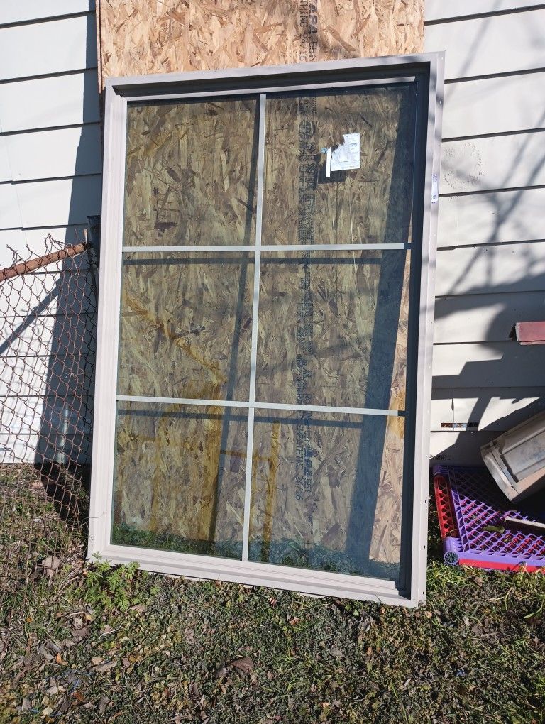 Window/Plywood