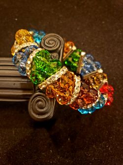 $15. TWO Gorgeous crystal glass multi-colored stretch rhinestone bracelets. 3/4 inch wide.