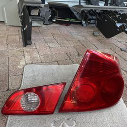 Infiniti G35 Passenger Side Rear Taillights /Brake Lights 