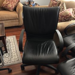 Black leather office chairs like new adjustable on wheels