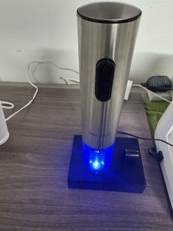 Secura Electric Wine Opener, Stainless steel electric wine opener with charging base.