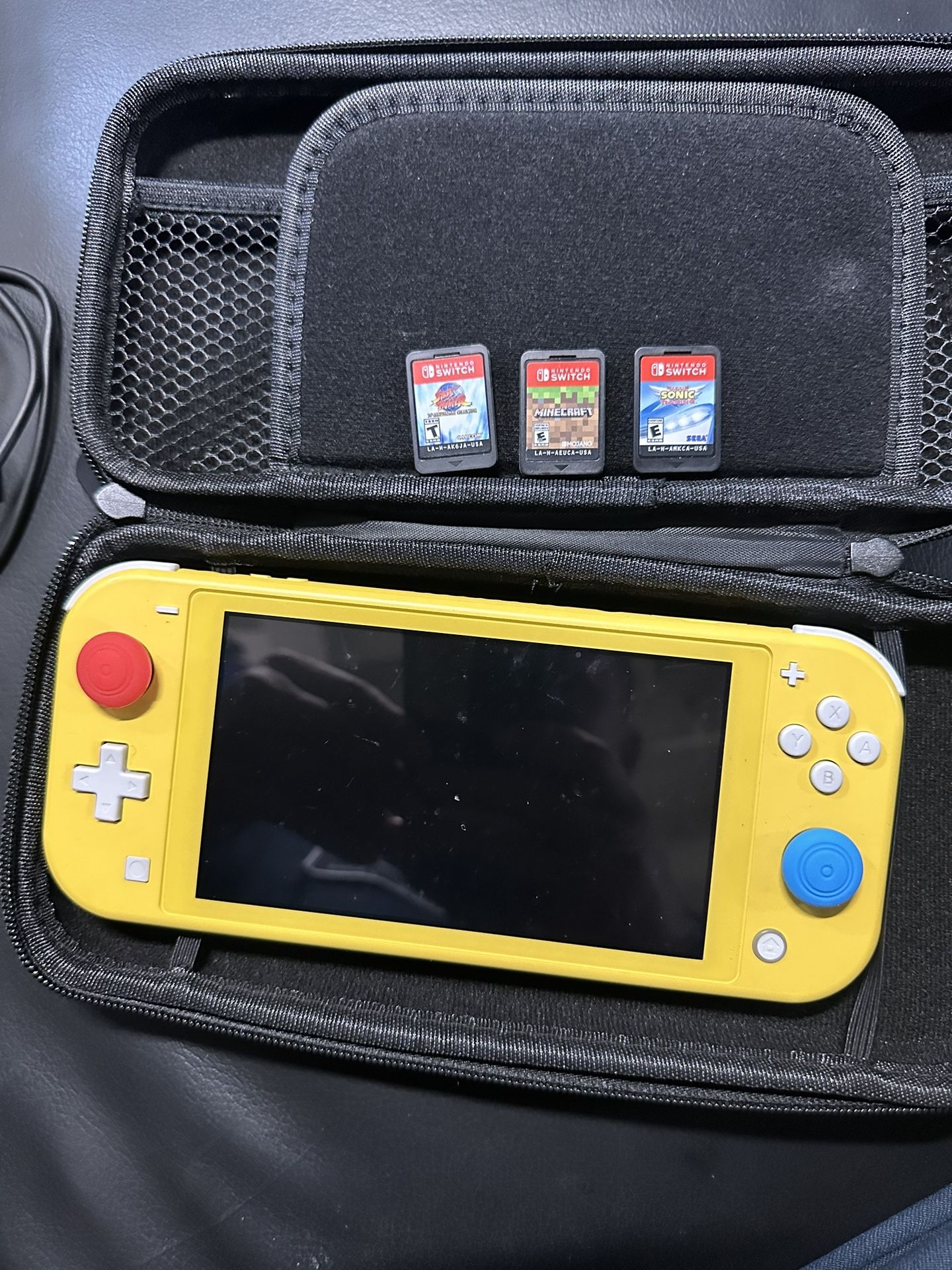 Nintendo Switch Lite With 3 Games And Memory Card