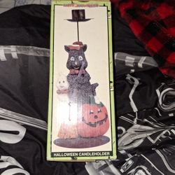  Halloween candle holder a black cat, a ghost, and a jack-o'-lantern. 