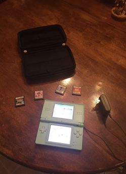 Nintendo NDS (older model) + 5 games and accessory case