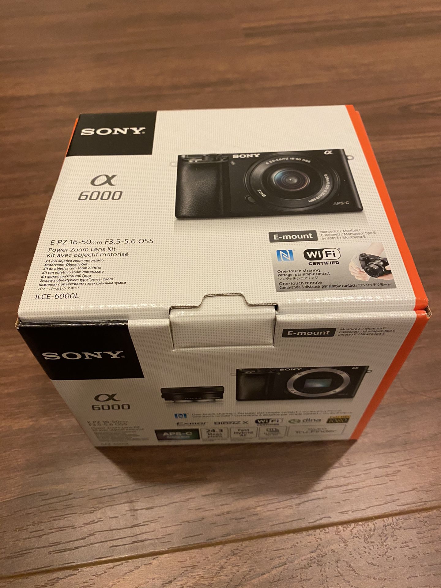 Brand New Sony Alpha a6000 DSLR w/16-50mm Power Zoom Lens
