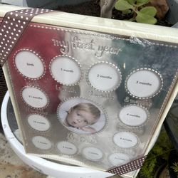 Ist Year Baby Photo holder By Carter’s New Never Used. $5