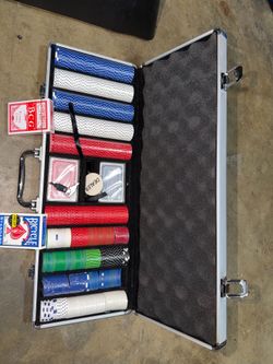 Poker set 529 chips aluminum case 4 decks  Some chips new some used 3 new decks one opened