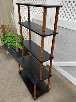 Funky antique book shelf or plant shelf