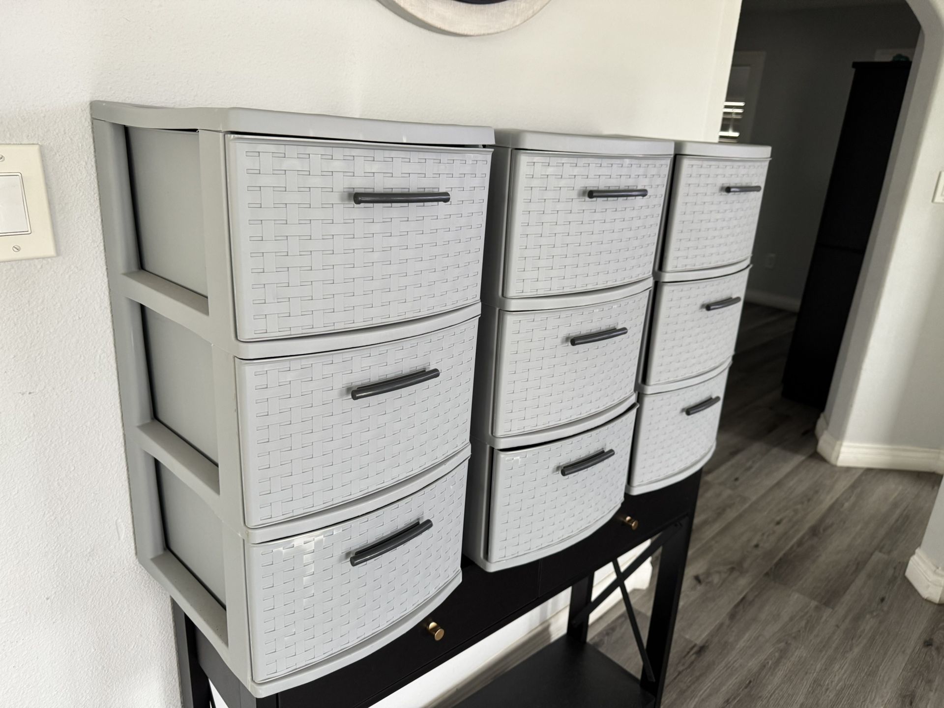 Three Plastic Storage Containers