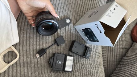 Canon 50mm lens f 1.4 + Flash Unit + Battery Charger + Bluetooth Clicker