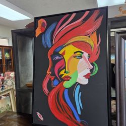 Acrylic face painting on canvas with a mix of neon colors,