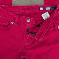 Designer mid-rise skinny jeans