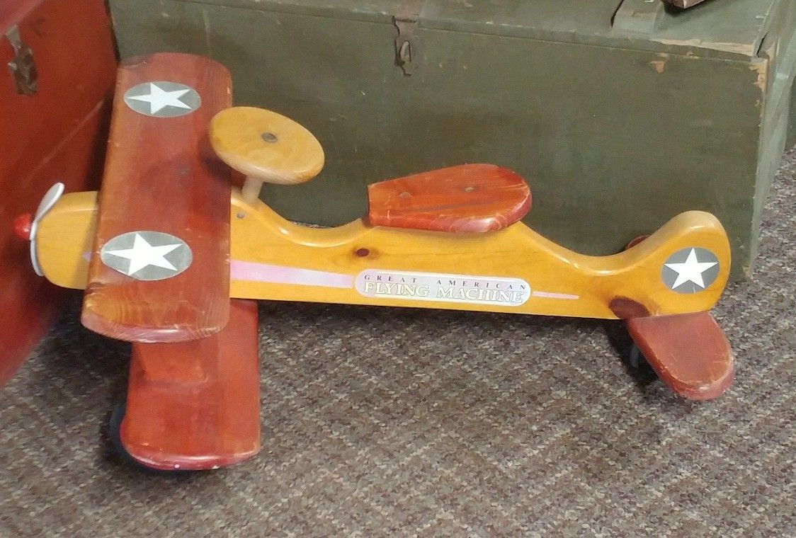 Wood airplane peddle toy