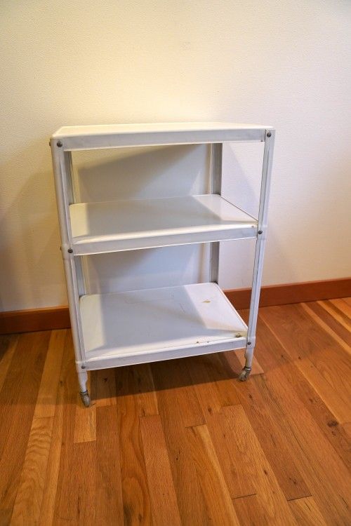 Fun vintage white metal rolling cart