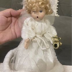 Vintage Angel Porcelain Doll 11” with blonde hair .