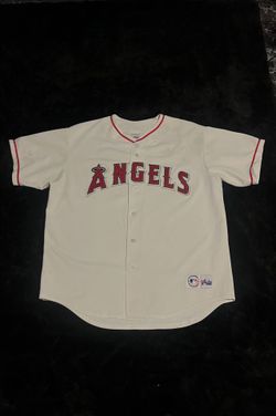 vintage Majestic MLB Anaheim/Los Angeles Angels white replica baseball jersey featuring the classic red "Angels" script logo across the chest