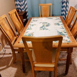 Italian Hand Painted Kitchen Table..Grape Vine Design!@..Solid Wood And Tile Top..Size 62x38 Wide 30 Inches Tall...6 Padded Solid Wood Kitchen Chairs.