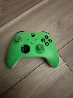 Microsoft Xbox Wireless Controller in Velocity Green, featuring a vibrant green top shell and textured grips