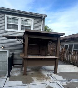 Keter 13.5' × 7.5' Signature Collection Resin Outdoor Bar Gazebo with Awning