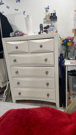 White cabinet/6 drawers.