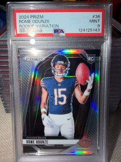 2024 Panini Prizm Rookie Variation Rome Odunze silver card #36 in a PSA mint 9
