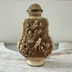  vintage tan/beige  snuff bottle intricate carved W/plastic spoon attached to the lid. 3” t