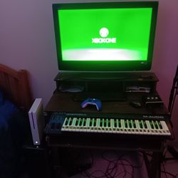 One TB Xbox One With Over 50 Games And Blue Controller.