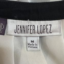This item is a Jennifer Lopez (JLO) women's colorful casual pleated striped blouse. 