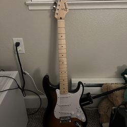 Squier Electric Guitar + Amp