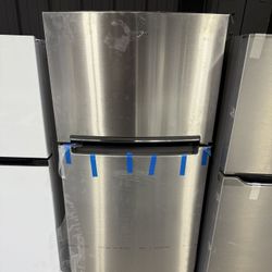 Brand new Whirlpool Stainless steel top and bottom refrigerator 