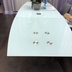Contemporary expanding dining table.
