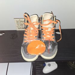 a pair of Nike Air Jordan 1 Mid SE 