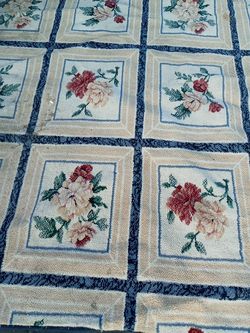 Rug 6ft. By 9 ft., needs a cleaning has a couple flaws but still a cheery piece