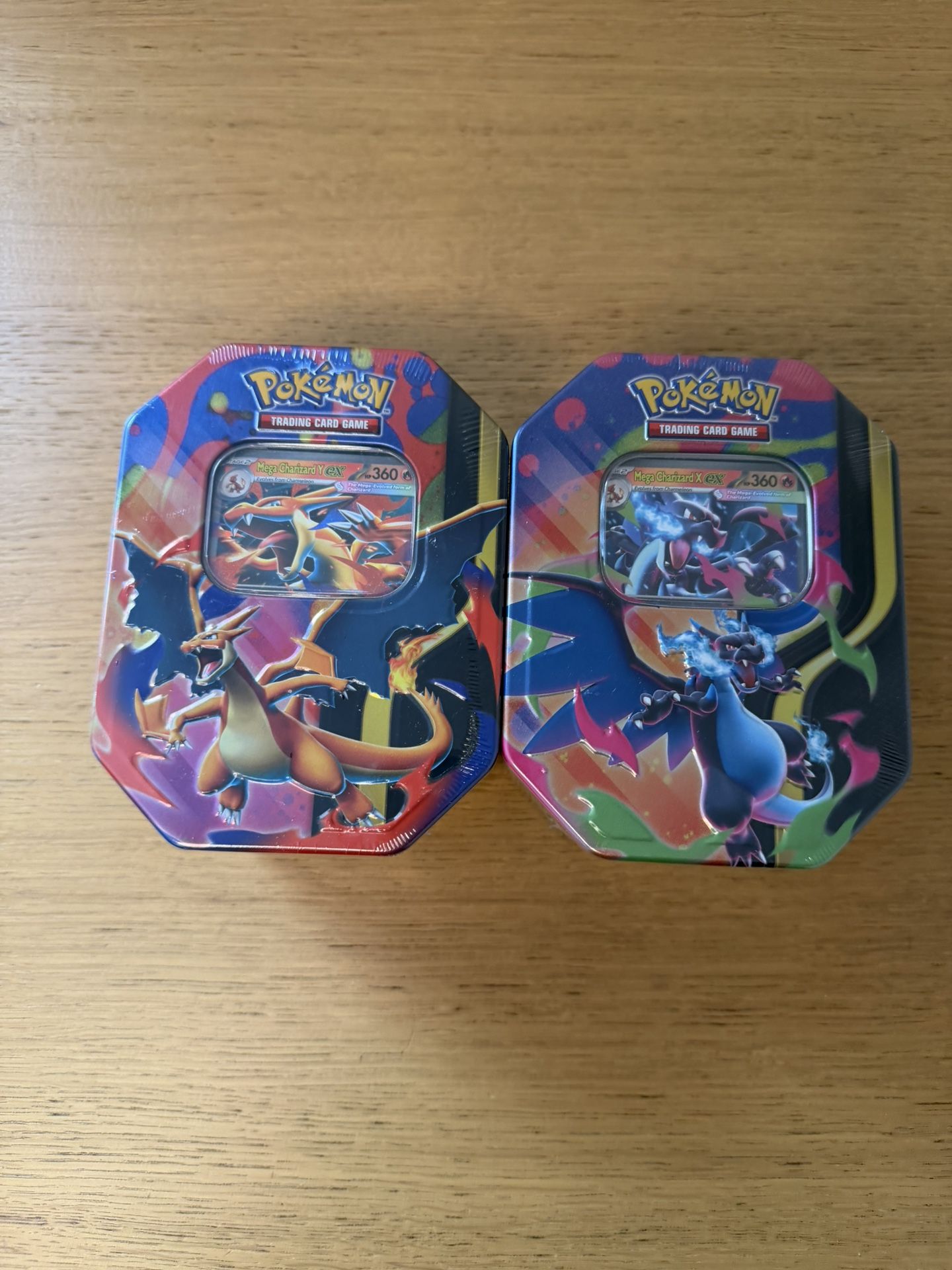 Pokemon Mega Charizard Tins