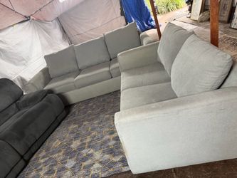 Gray couch and loveseat great condition clean we sell all the time delivery $40 local